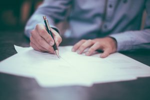 A man reads his investment literature