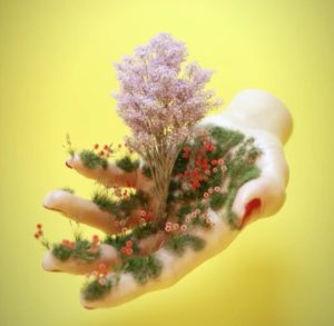 A computer generated design of a hand to signify bringing to life